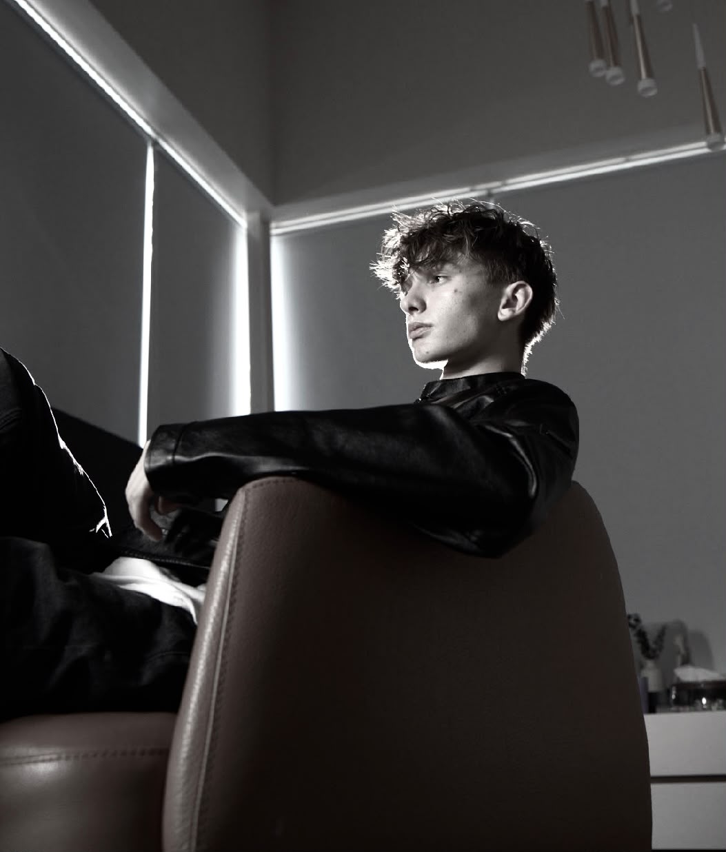 Cinematic black and white editorial photograph of Teo Ladrière